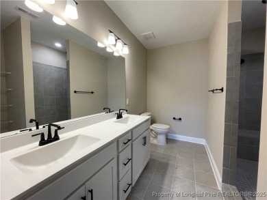 This beautiful three bedroom, two bathroom luxury condo in on Anderson Creek Golf Club in North Carolina - for sale on GolfHomes.com, golf home, golf lot
