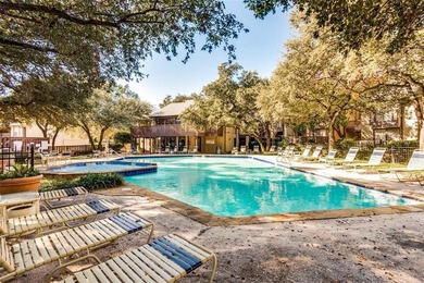 This modern updated condo offers quartz counters, cement tile on Las Colinas Country Club in Texas - for sale on GolfHomes.com, golf home, golf lot