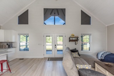 74 Blue Herring Drive offers a harmonious blend of comfort and on  in Tennessee - for sale on GolfHomes.com, golf home, golf lot