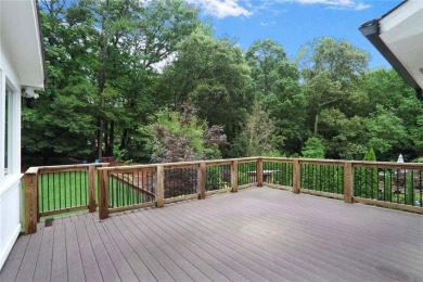 Completely updated move-in ready home in fantastic neighborhood on TPC At Sugarloaf Golf Club in Georgia - for sale on GolfHomes.com, golf home, golf lot