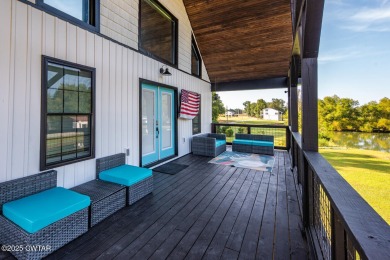 74 Blue Herring Drive offers a harmonious blend of comfort and on  in Tennessee - for sale on GolfHomes.com, golf home, golf lot