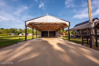 74 Blue Herring Drive offers a harmonious blend of comfort and on  in Tennessee - for sale on GolfHomes.com, golf home, golf lot
