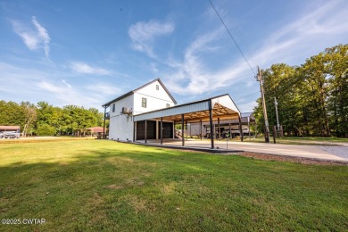 74 Blue Herring Drive offers a harmonious blend of comfort and on  in Tennessee - for sale on GolfHomes.com, golf home, golf lot