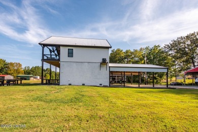 74 Blue Herring Drive offers a harmonious blend of comfort and on  in Tennessee - for sale on GolfHomes.com, golf home, golf lot