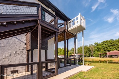 74 Blue Herring Drive offers a harmonious blend of comfort and on  in Tennessee - for sale on GolfHomes.com, golf home, golf lot