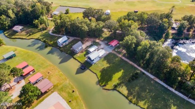 74 Blue Herring Drive offers a harmonious blend of comfort and on  in Tennessee - for sale on GolfHomes.com, golf home, golf lot