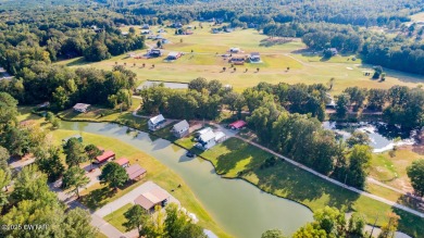 74 Blue Herring Drive offers a harmonious blend of comfort and on  in Tennessee - for sale on GolfHomes.com, golf home, golf lot