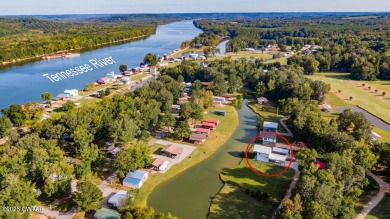 74 Blue Herring Drive offers a harmonious blend of comfort and on  in Tennessee - for sale on GolfHomes.com, golf home, golf lot