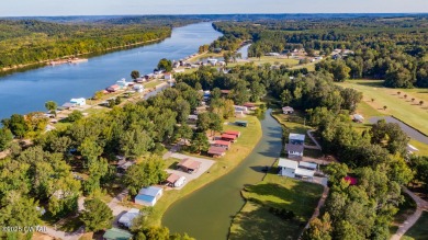 74 Blue Herring Drive offers a harmonious blend of comfort and on  in Tennessee - for sale on GolfHomes.com, golf home, golf lot
