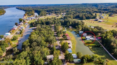 74 Blue Herring Drive offers a harmonious blend of comfort and on  in Tennessee - for sale on GolfHomes.com, golf home, golf lot