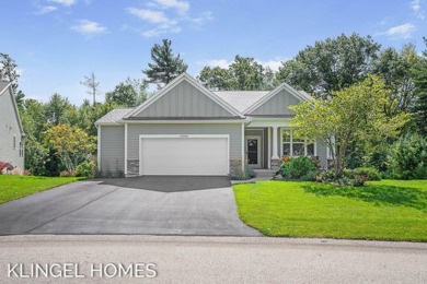 Welcome to 12604 Retreat Dr, Grand Haven! This beautifully on Grand Haven Golf Club in Michigan - for sale on GolfHomes.com, golf home, golf lot