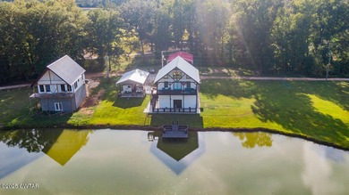 74 Blue Herring Drive offers a harmonious blend of comfort and on Tennessee River Golf Club in Tennessee - for sale on GolfHomes.com, golf home, golf lot