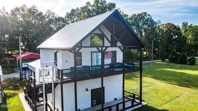 74 Blue Herring Drive offers a harmonious blend of comfort and on Tennessee River Golf Club in Tennessee - for sale on GolfHomes.com, golf home, golf lot