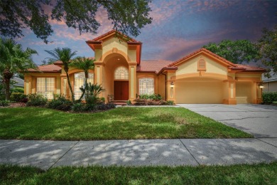 PRICE REDUCED! Luxury living in the Osprey Pointe Subdivision of on Hunters Green Country Club in Florida - for sale on GolfHomes.com, golf home, golf lot