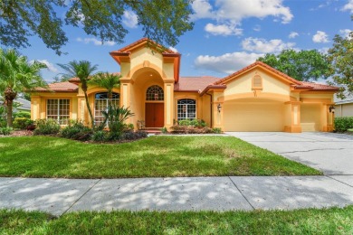 PRICE REDUCED! Luxury living in the Osprey Pointe Subdivision of on Hunters Green Country Club in Florida - for sale on GolfHomes.com, golf home, golf lot