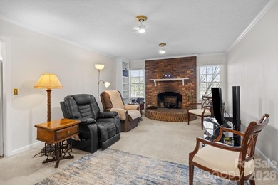 Set along a golf-course setting with a generous lot and room to on  in North Carolina - for sale on GolfHomes.com, golf home, golf lot