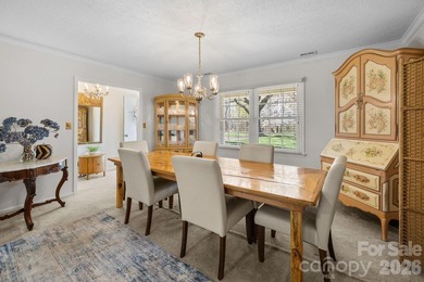 Set along a golf-course setting with a generous lot and room to on  in North Carolina - for sale on GolfHomes.com, golf home, golf lot