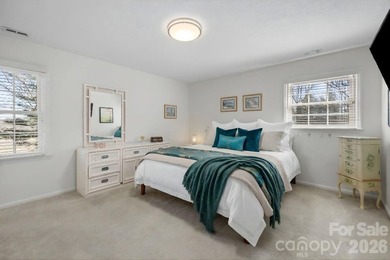 Set along a golf-course setting with a generous lot and room to on  in North Carolina - for sale on GolfHomes.com, golf home, golf lot