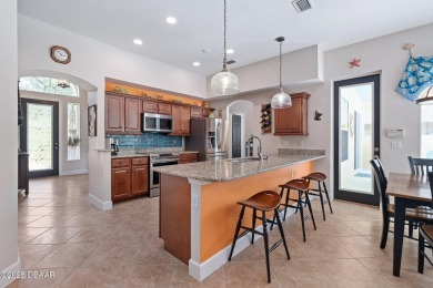 Located in the highly sought after, guard gated community of on Plantation Bay Golf and Country Club in Florida - for sale on GolfHomes.com, golf home, golf lot