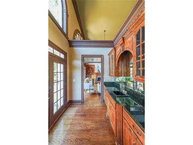 Magnificent four sides brick home with sweeping golf course on TPC At Sugarloaf Golf Club in Georgia - for sale on GolfHomes.com, golf home, golf lot