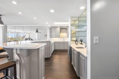 Oceanfront paradise awaits! This spacious, open-plan condo on Sailfish Point Golf Club, Inc. in Florida - for sale on GolfHomes.com, golf home, golf lot