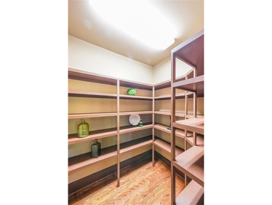 Magnificent four sides brick home with sweeping golf course on TPC At Sugarloaf Golf Club in Georgia - for sale on GolfHomes.com, golf home, golf lot