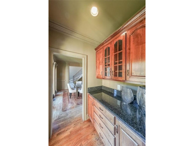 Magnificent four sides brick home with sweeping golf course on TPC At Sugarloaf Golf Club in Georgia - for sale on GolfHomes.com, golf home, golf lot