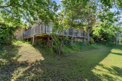 Looking for a home with stunning views and a modern open on Eagle Mountain Country Club  in Texas - for sale on GolfHomes.com, golf home, golf lot