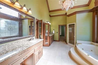 Magnificent four sides brick home with sweeping golf course on TPC At Sugarloaf Golf Club in Georgia - for sale on GolfHomes.com, golf home, golf lot