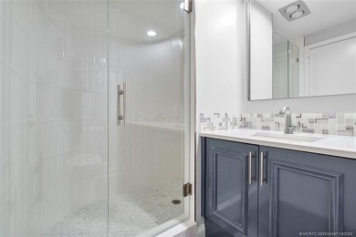 Oceanfront paradise awaits! This spacious, open-plan condo on Sailfish Point Golf Club, Inc. in Florida - for sale on GolfHomes.com, golf home, golf lot