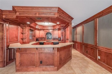 Magnificent four sides brick home with sweeping golf course on TPC At Sugarloaf Golf Club in Georgia - for sale on GolfHomes.com, golf home, golf lot