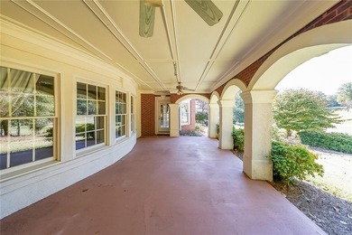 Magnificent four sides brick home with sweeping golf course on TPC At Sugarloaf Golf Club in Georgia - for sale on GolfHomes.com, golf home, golf lot