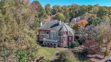 Magnificent four sides brick home with sweeping golf course on TPC At Sugarloaf Golf Club in Georgia - for sale on GolfHomes.com, golf home, golf lot