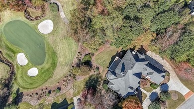 Magnificent four sides brick home with sweeping golf course on TPC At Sugarloaf Golf Club in Georgia - for sale on GolfHomes.com, golf home, golf lot