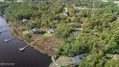 Discover the perfect opportunity to build your dream home on on Harbour Point Golf Club in North Carolina - for sale on GolfHomes.com, golf home, golf lot