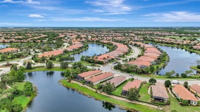Experience resort-style and maintenance-free living in this on Esplanade Golf and Country at Lakewood Ranch in Florida - for sale on GolfHomes.com, golf home, golf lot