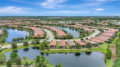 Experience resort-style and maintenance-free living in this on Esplanade Golf and Country at Lakewood Ranch in Florida - for sale on GolfHomes.com, golf home, golf lot