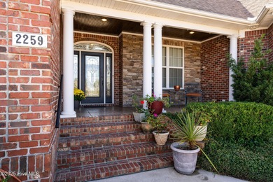 Experience the luxury of coastal living in this 4 bedroom, 4.5 on Compass Pointe Golf Course in North Carolina - for sale on GolfHomes.com, golf home, golf lot