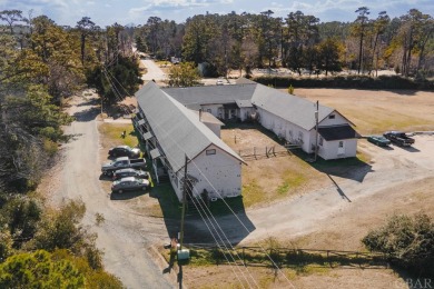 The former Kitty Hawk Schoolhouse located on Kitty Hawk Road on Seascape Golf Links in North Carolina - for sale on GolfHomes.com, golf home, golf lot