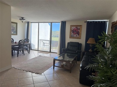 Beautiful upper level townhouse walking distance to the Club on Boca West Golf and Country Club in Florida - for sale on GolfHomes.com, golf home, golf lot