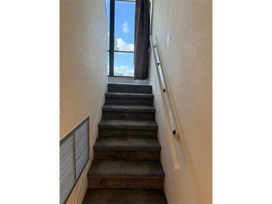 Beautiful upper level townhouse walking distance to the Club on Boca West Golf and Country Club in Florida - for sale on GolfHomes.com, golf home, golf lot