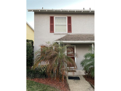 Welcome to this charming 2-bedroom, 2.5-bath condominium located on Errol Estates Country Club in Florida - for sale on GolfHomes.com, golf home, golf lot