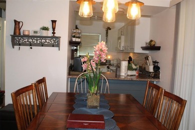 Welcome to this charming 2-bedroom, 2.5-bath condominium located on Errol Estates Country Club in Florida - for sale on GolfHomes.com, golf home, golf lot