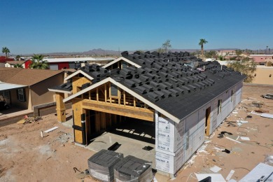 Welcome to Links at Coyote Wash! This brand-new home features on The Links At Coyote Wash in Arizona - for sale on GolfHomes.com, golf home, golf lot