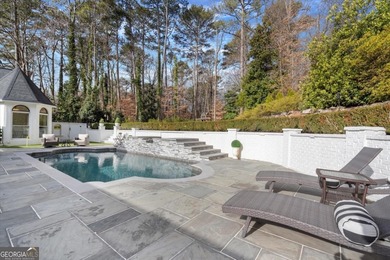 Tucked away on a quiet cul-de-sac in the prestigious Atlanta on Atlanta Country Club in Georgia - for sale on GolfHomes.com, golf home, golf lot