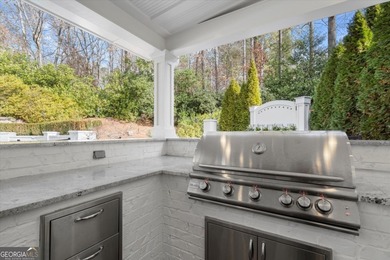 Tucked away on a quiet cul-de-sac in the prestigious Atlanta on Atlanta Country Club in Georgia - for sale on GolfHomes.com, golf home, golf lot