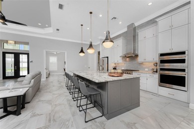 Luxurious Pebble Beach Model in Boca Royale Golf & Country Club
 on Boca Royale Golf and Country Club in Florida - for sale on GolfHomes.com, golf home, golf lot