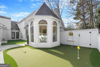 Tucked away on a quiet cul-de-sac in the prestigious Atlanta on Atlanta Country Club in Georgia - for sale on GolfHomes.com, golf home, golf lot