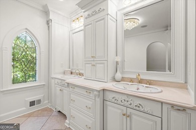 Tucked away on a quiet cul-de-sac in the prestigious Atlanta on Atlanta Country Club in Georgia - for sale on GolfHomes.com, golf home, golf lot