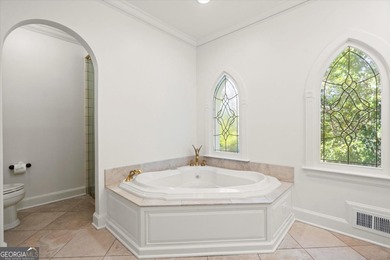 Tucked away on a quiet cul-de-sac in the prestigious Atlanta on Atlanta Country Club in Georgia - for sale on GolfHomes.com, golf home, golf lot